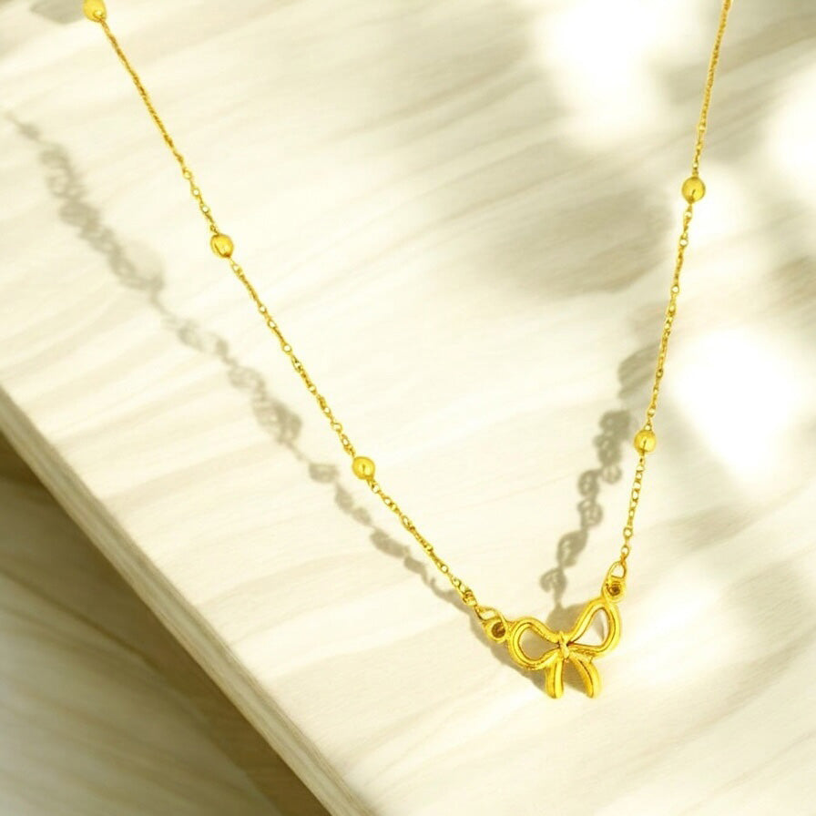Simple Bow Heart Pendant