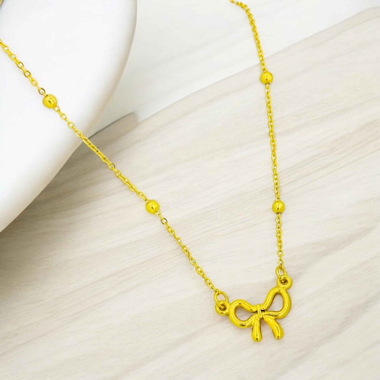Simple Bow Heart Pendant