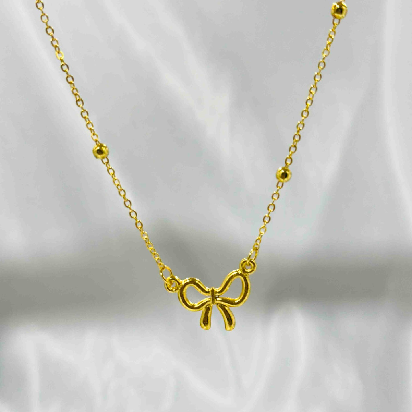 Simple Bow Heart Pendant